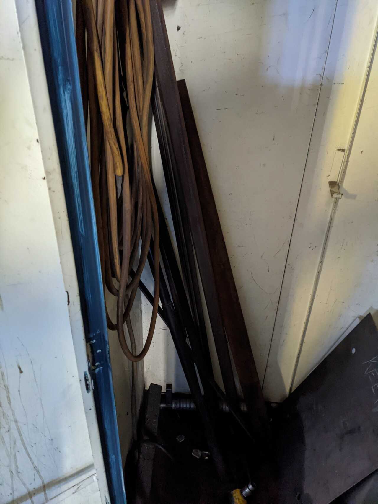2 DOOR TOOL CABINET WITH CONTENTS, ASSORTED TOOLS, HYDRAULIC CYLINDERS, WIRE, GREASE GUN - TOOL STORAGE