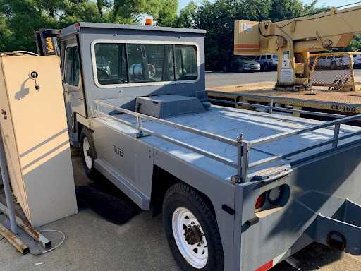 1991 AIRPORT UTILITY TUG - INDUSTRIAL PARTS