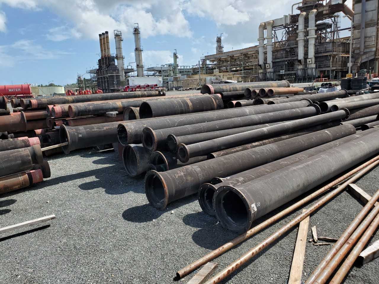 ROW OF ASSORTED US PIPE TYTON JOINT DUCTILE IRON PIPES, 8IN, 10IN, 12IN, 14IN, 16IN, 18IN, 24IN - HAND TOOLS