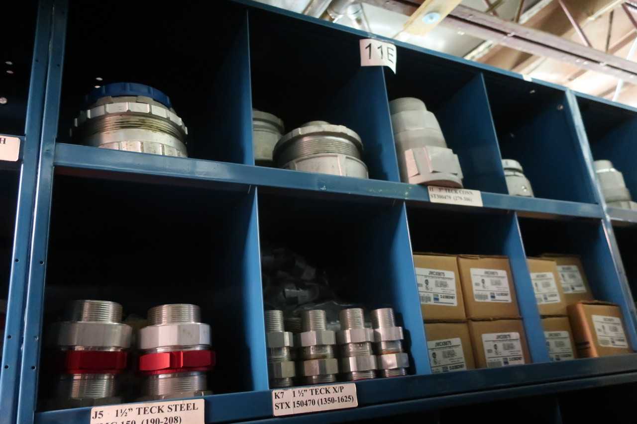 CONTENTS OF 4X STACKED PIGEON HOLE CABINET, ASSORTED ELECTRICAL CONDUIT - ELECTRICAL COMPONENTS