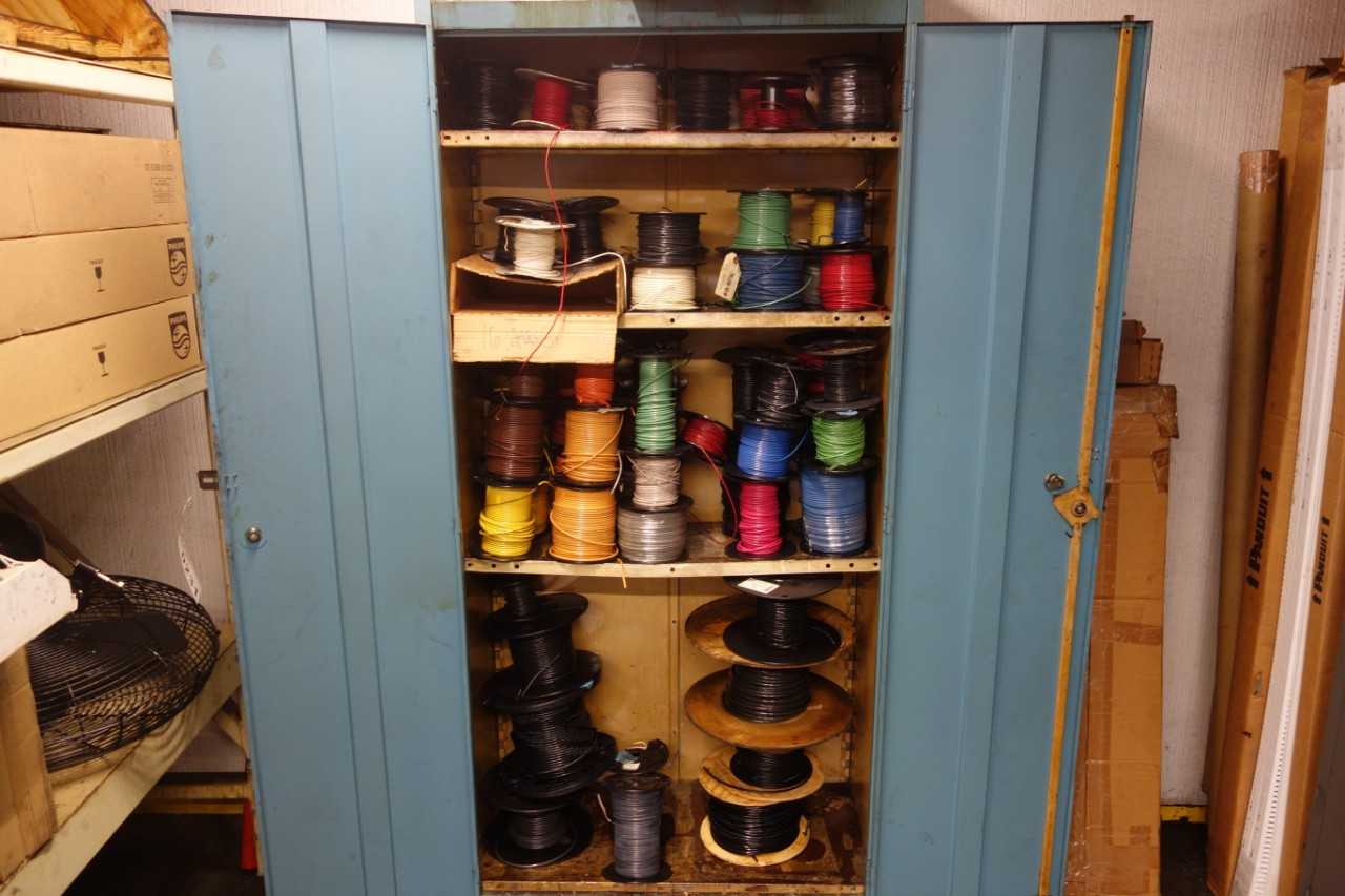 Cabinet with assorted wire and cable spools - ELECTRICAL COMPONENTS