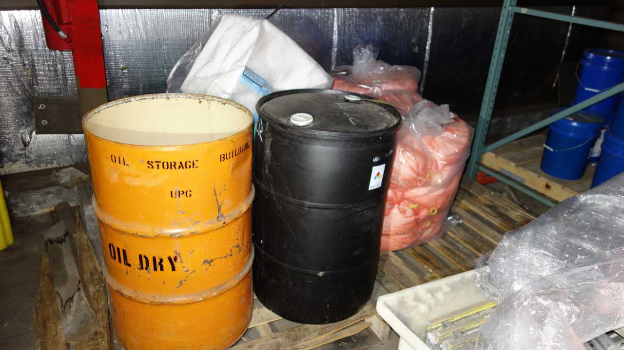 ASSORTED CONTENTS ON FLOOR, DRUMS, SORBENT BOOMS - PLANT & FACILITY