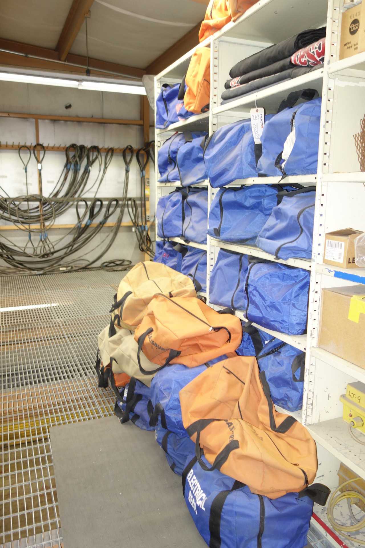 Contents of 2x sections shelving - assorted electrical safety suits and face shields - SHELVING