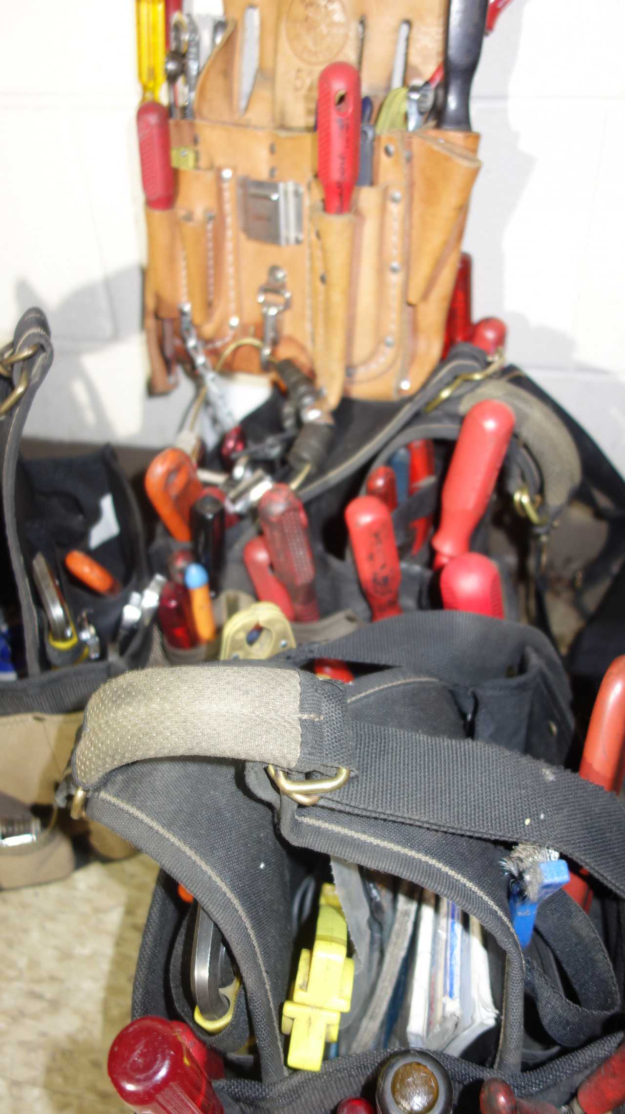 LOT OF ASSORTED HAND TOOLS WITH TOOL HOLDERS - HAND TOOLS