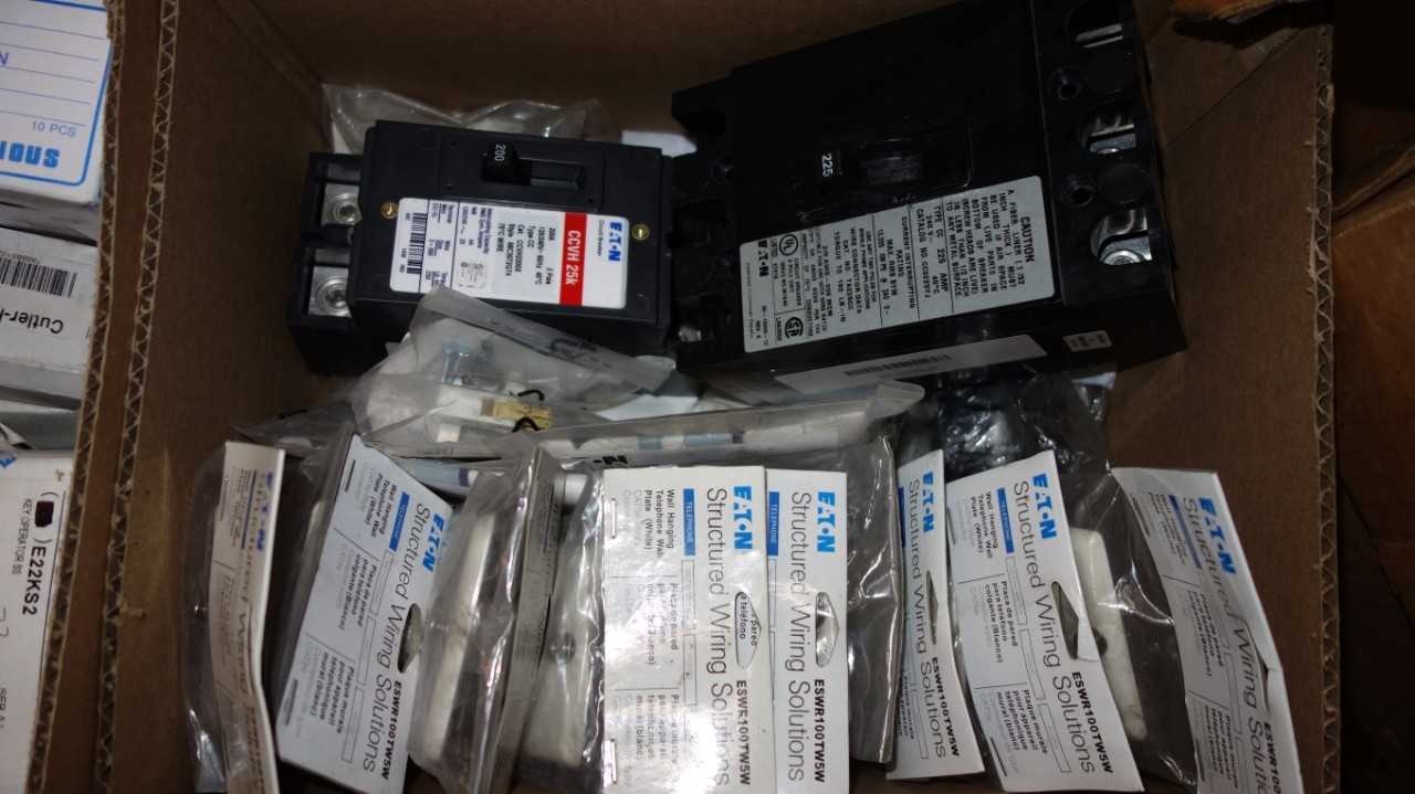 1 BOX OF ASSORTED EATON ELECTRIC PARTS, BREAKERS, PLATES - ELECTRICAL COMPONENTS