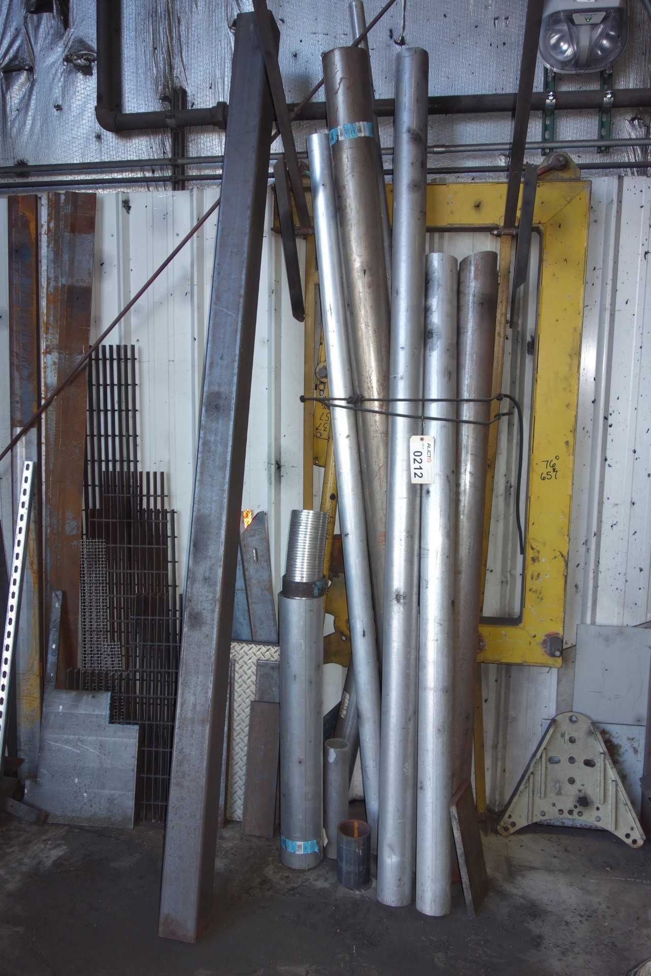 WALL OF ASSORTED STEEL, PIPING - TOOL STORAGE