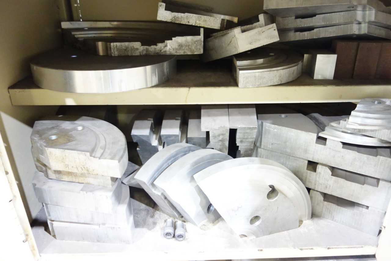 Contents of Steel Work Table - Aluminum Snout Ring Circular Chucks, Gears - PLANT & FACILITY