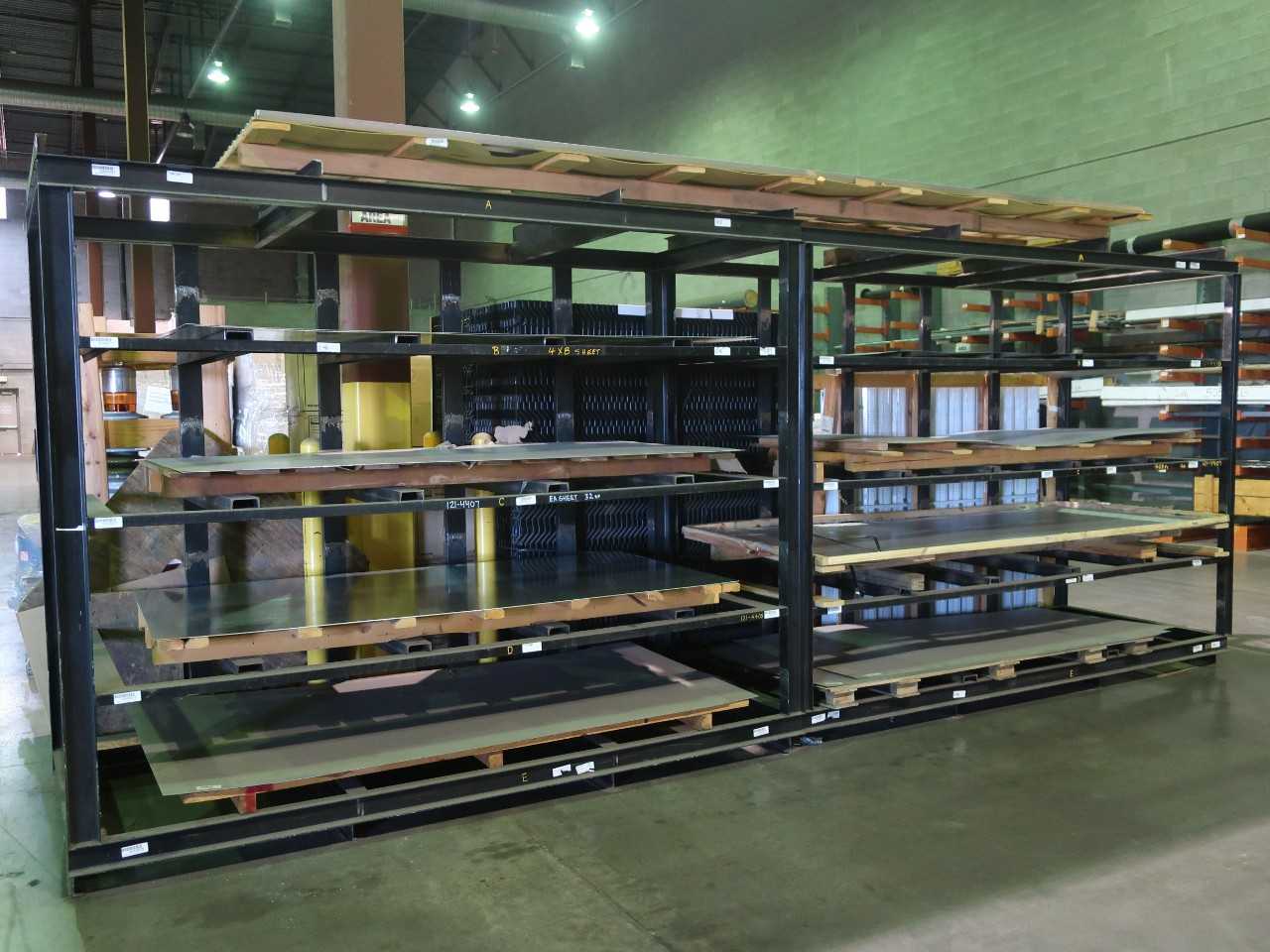 Lot of 2 sections black pallet racking, 8' high 10' wide 4' deep, contents included - PALLET RACKING
