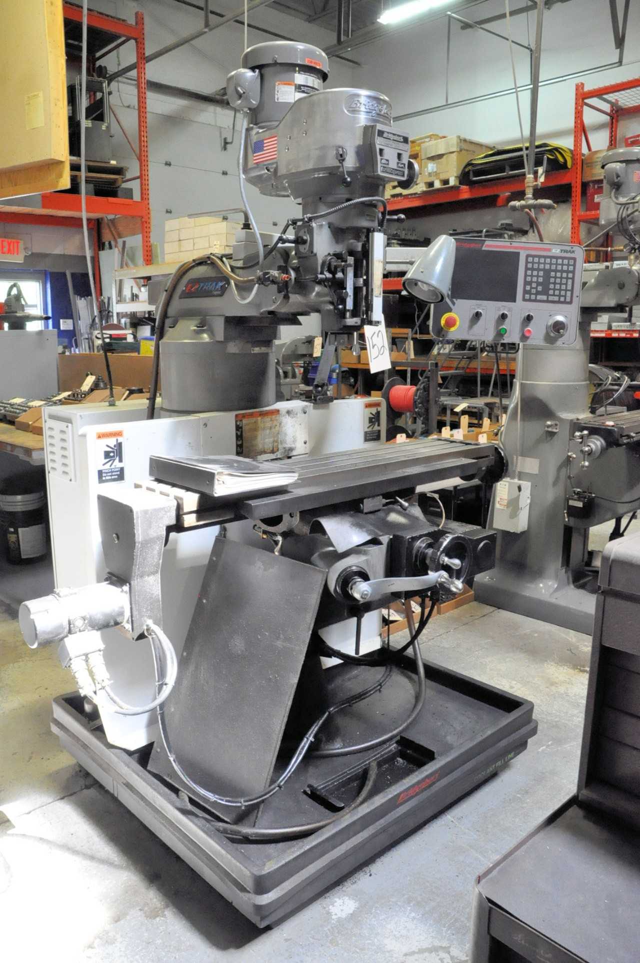 Bridgeport EZ Trak CNC 2-HP Variable Speed Vertical Milling Machine, S/n BR284945E, Bridgeport EZ Trak CNC Controller, 9" x 48" Power Feed Table, 7" Riser, Quick Change Tooling Holder, Work Light - CNC MACHINING CENTERS