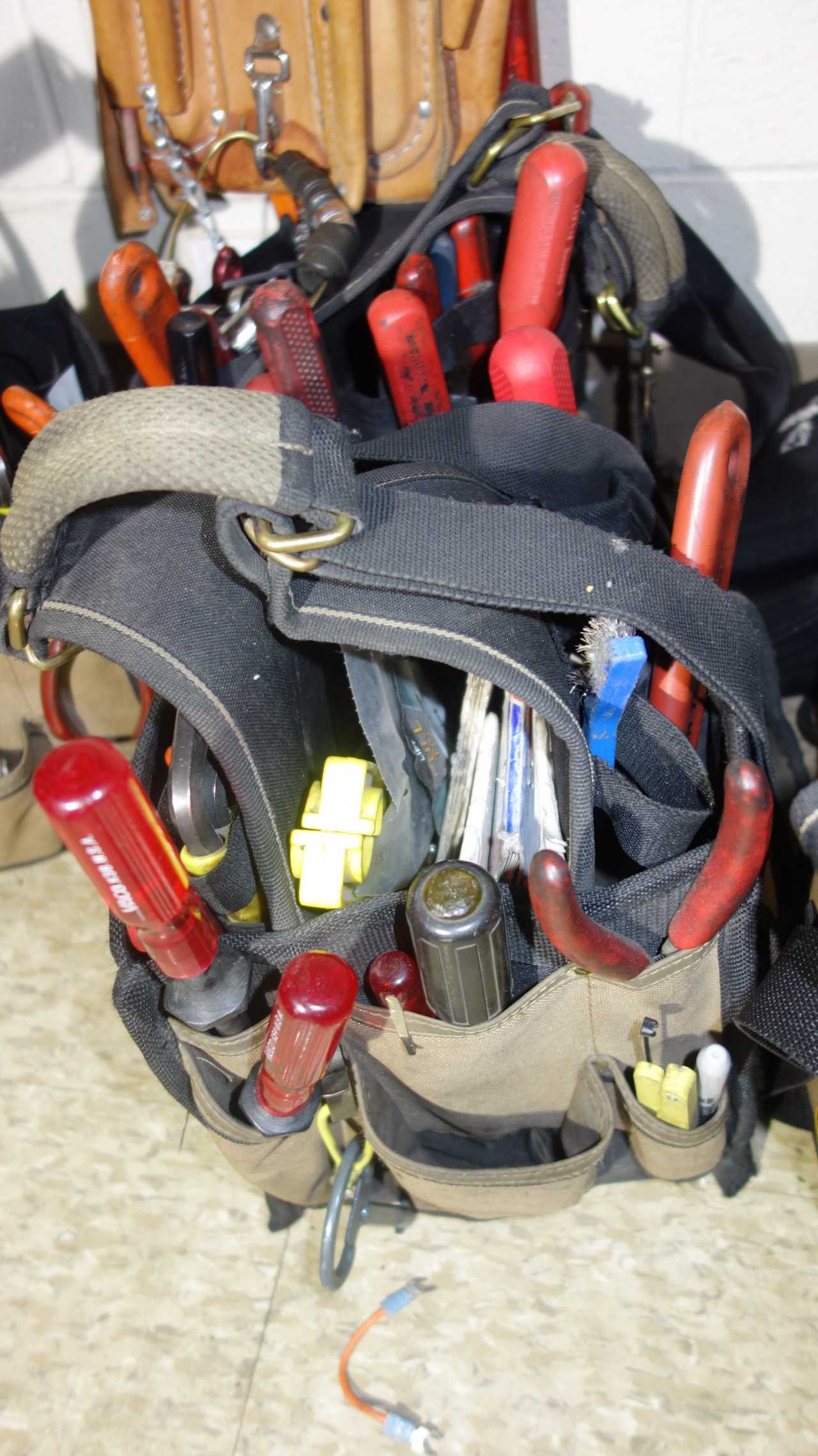 LOT OF ASSORTED HAND TOOLS WITH TOOL HOLDERS - HAND TOOLS