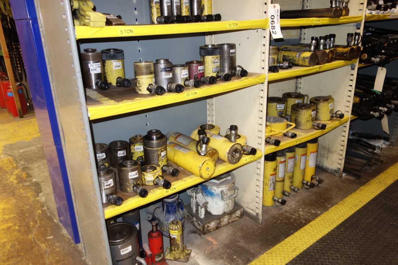 Contents of 3x sections shelving - hydraulic rams, adapters, hoses, and attachments - SHELVING