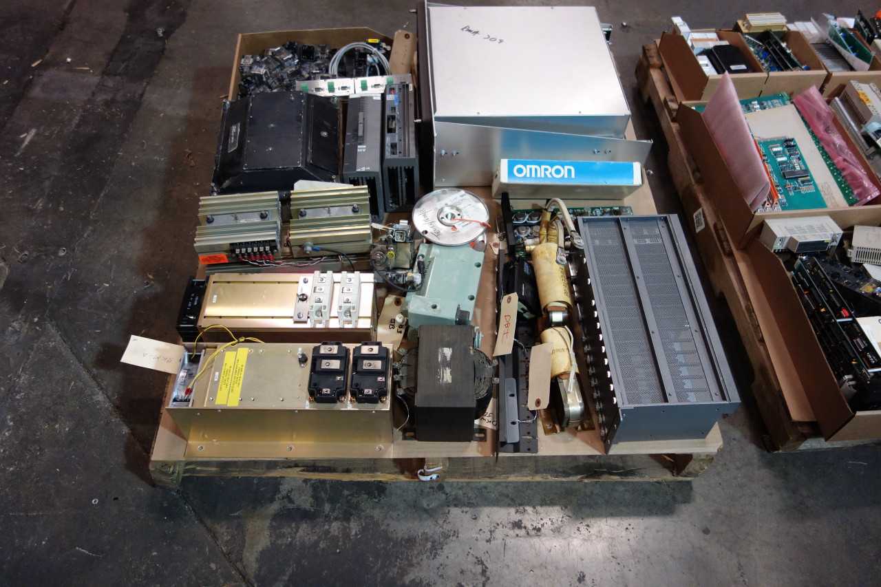 2 PALLETS OF ASSORTED ELECTRICAL MODULES, CIRCUIT BOARDS, TRANSFORMERS, COMMUNICATION INTERFACE, CONTROLLERS, ISOLATORS - OMRON, ALLEN BRADLEY, SANYO - ELECTRICAL PARTS