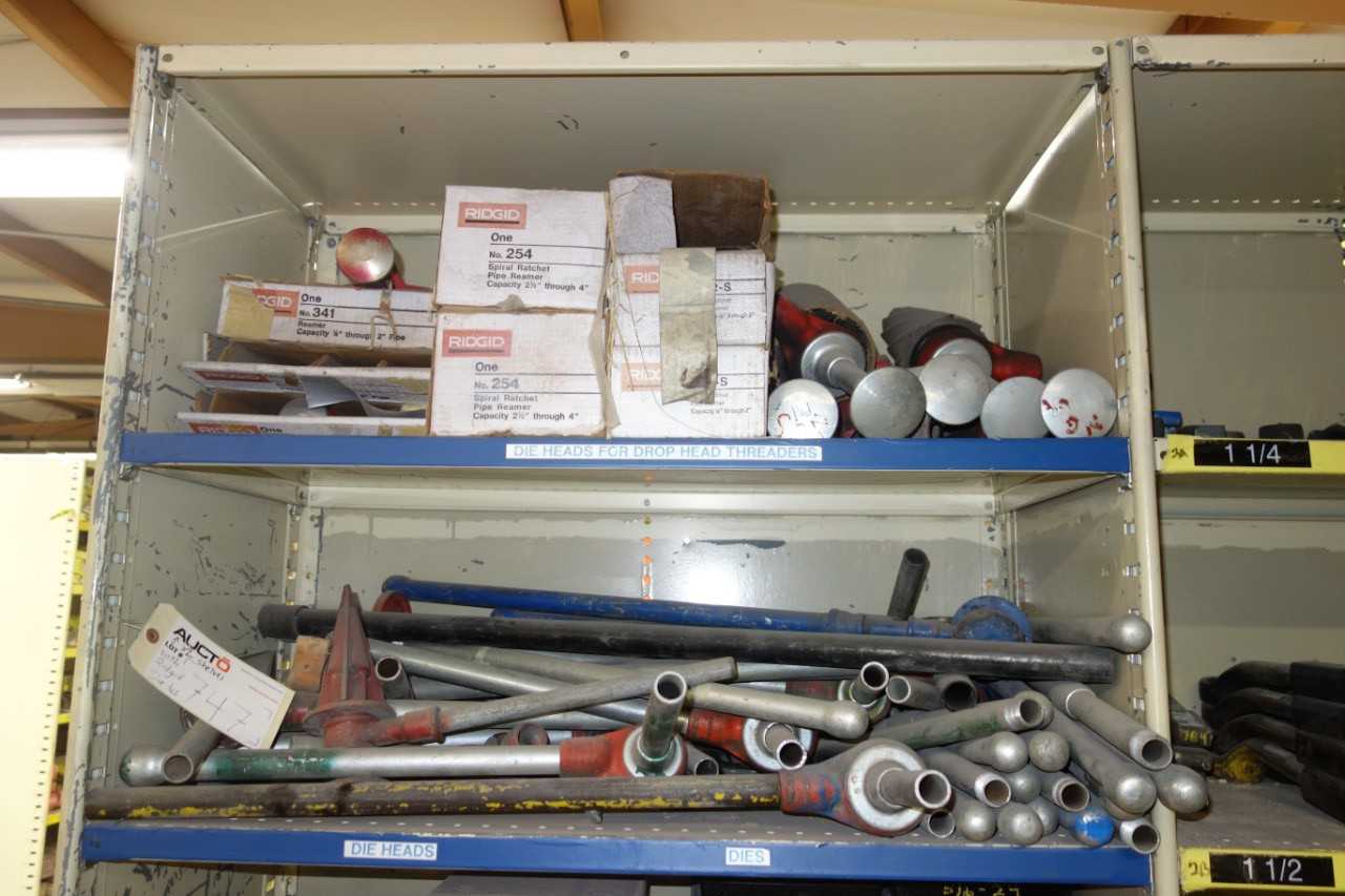 Contents of 2x shelving - Ridgid pipe threaders, pipe cutters, pipe die parts - HAND TOOLS