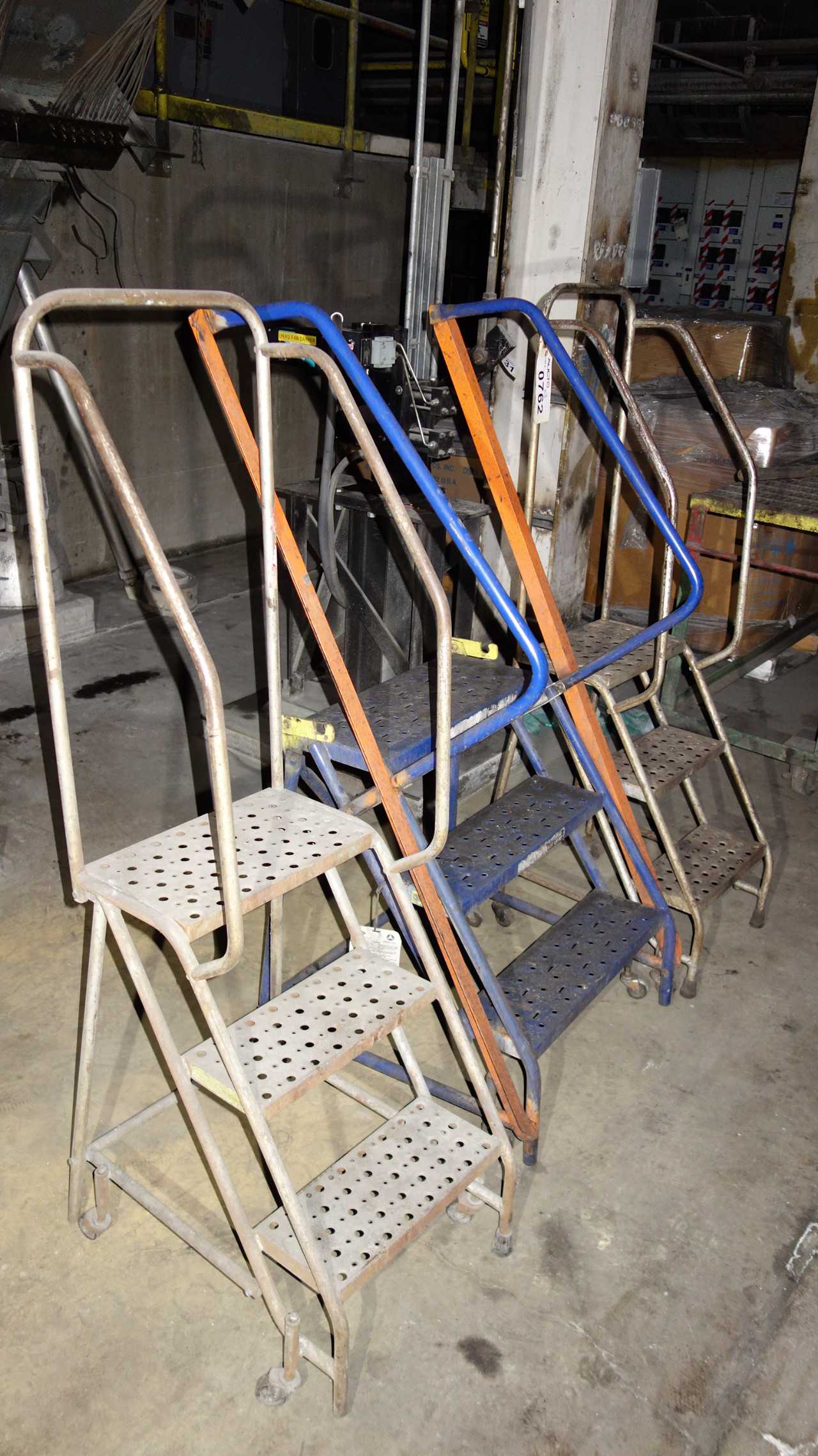 LOT OF 3 ROLLING STEP LADDERS - MATERIAL HANDLING