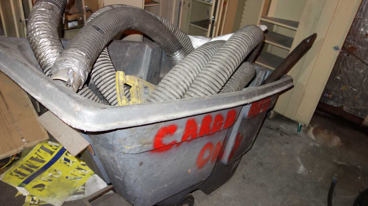 LOT OF ASSORTED HOSE ON CANTILEVER RACKNG AND BINS - ELECTRIC POWER TOOLS
