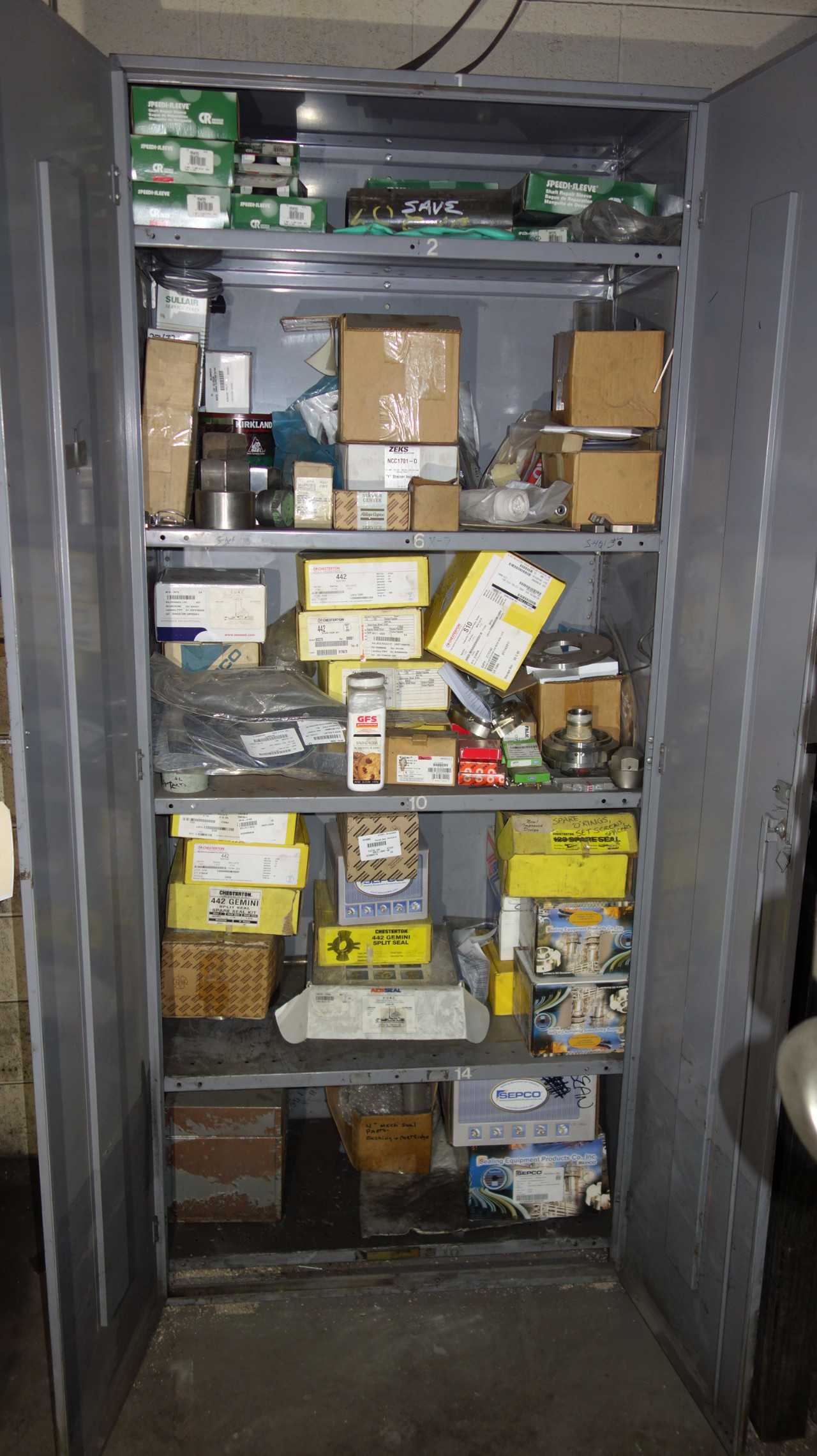 CONTENTS OF CABINET WITH SPARE PUMP PARTS - MISCELLANEOUS