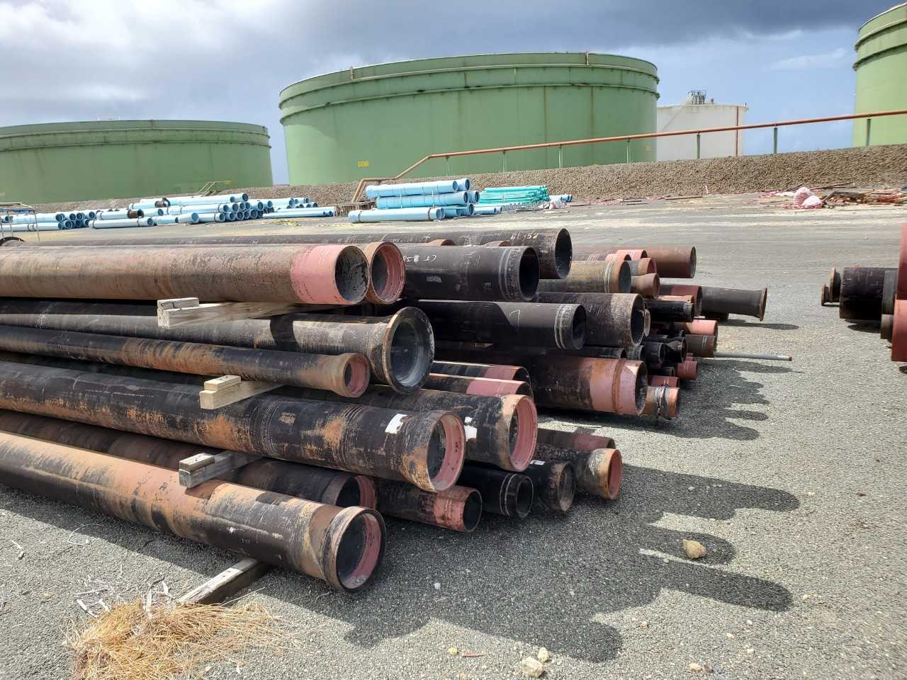ROW OF ASSORTED US PIPE TYTON JOINT DUCTILE IRON PIPES, 6IN, 8IN, 10IN, 12IN, 14IN - HAND TOOLS