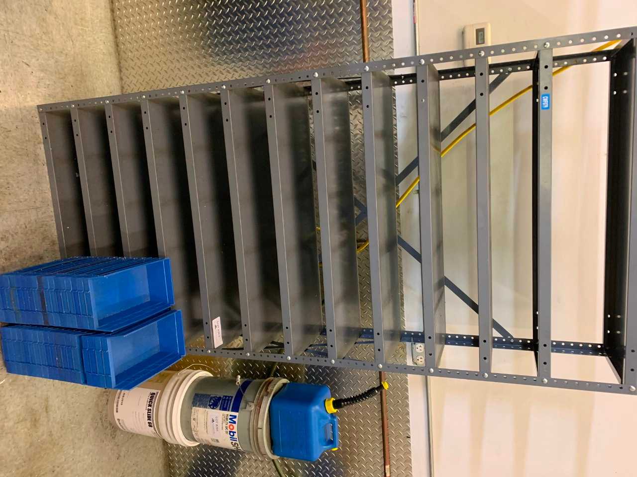 Shelf with blue bins - TOOL STORAGE