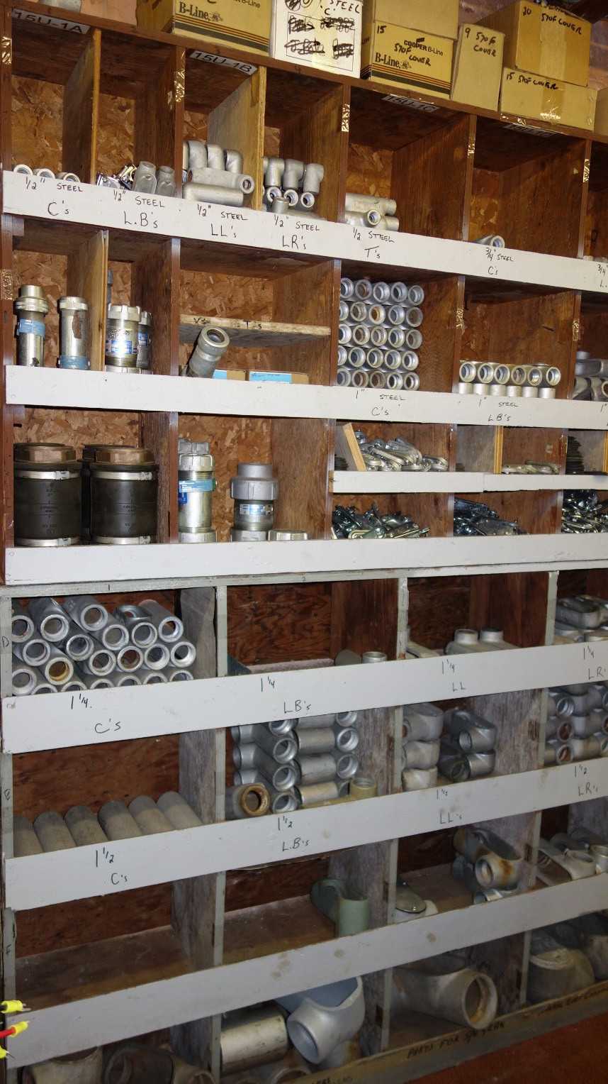 CONTENTS OF PIGEON HOLE CABINET, ASSORTED ELECTRIC CONDUIT FITTINGS - CONDUIT FITTING