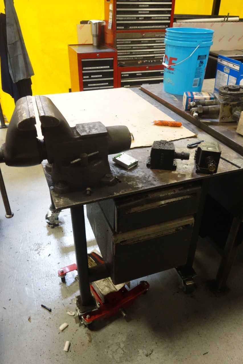 5' X 3' rolling steel work table with 8" bench vise - PLANT & FACILITY