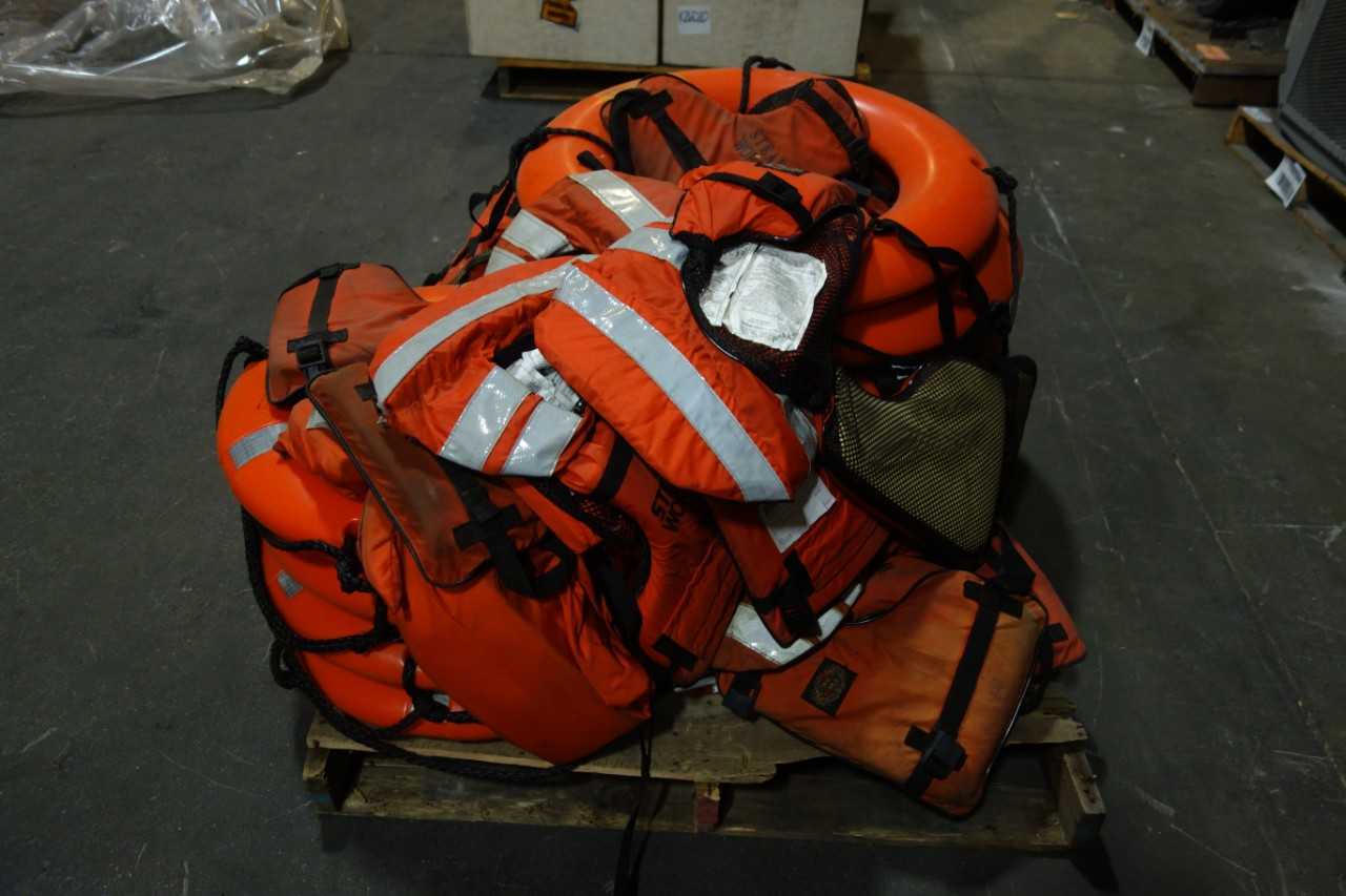 1 PALLET OF ASSORTED STEARNS LIFE JACKETS  LIFE BUOY  LIFE PRESERVERS - SAFETY EQUIPMENT