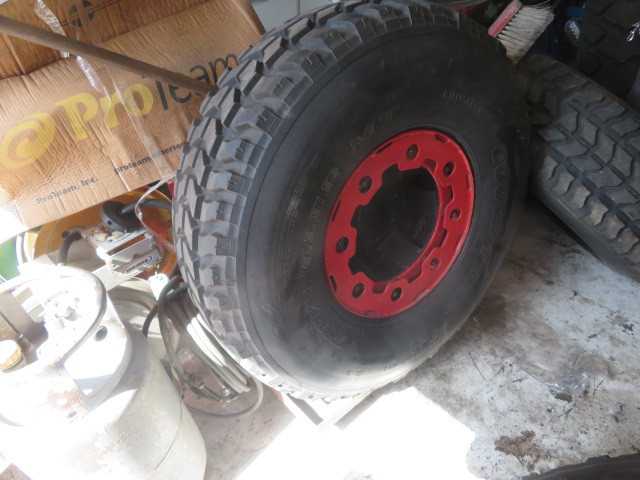 Wrangle Tire Model 37X12.5 OR 16.5 LT Tire and rims (4) each in this Lot - INDUSTRIAL PARTS